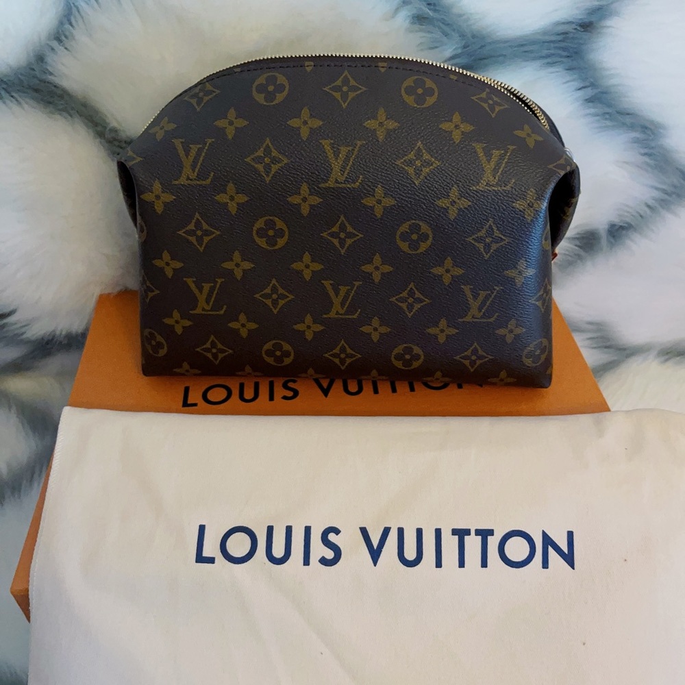 Authentic brand new LV cosmetics bag with dust bag and box